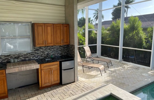 Isles of Capri House | Private Waterfront home with pool and hot tub with large dock in Isle of Capri