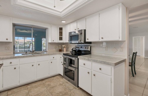 Punta Gorda House | Punta Gorda 3-Bedroom Canalfront Pool Home with Dock