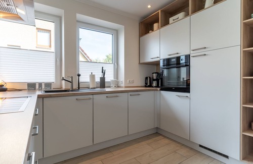 Toenning Apartment | Pure Eleganz am Wasser: Ferienhaus Poller 25 am Tönninger Hafen