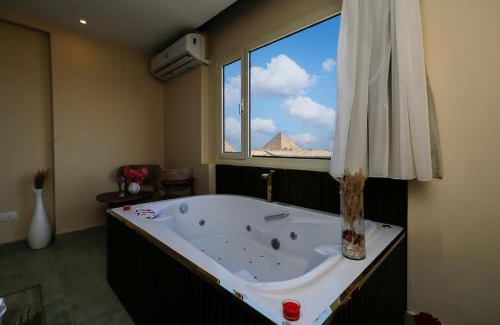 Kafrat al Jabal Hotel | pyramids palace view