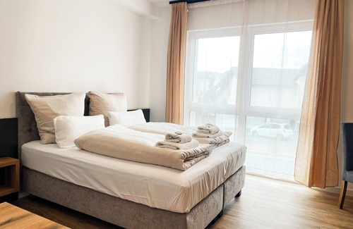 Detmold Hotel | Qonroom - Detmold - shared kitchen - BBQ - App2