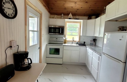 Lower Montague Cottage | Quaint 2 bedroom water view cottage. Near great golfing, beaches and breweries.