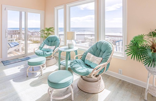Village of Stump Sound House | Quaint beachfront cottage with Ping-Pong table, decks, community pool & views