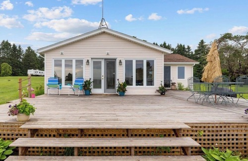 Rice Point Cottage | Quaint Cottage with direct beach access and water views that go on for miles.