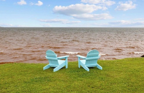 Rice Point Cottage | Quaint Cottage with direct beach access and water views that go on for miles.