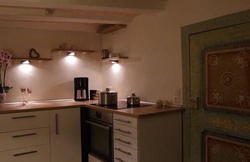 Hofen Apartment | Quaint, old farmhouse from 1837 invites you to linger.