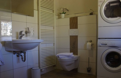 Hofen Apartment | Quaint, old farmhouse from 1837 invites you to linger.