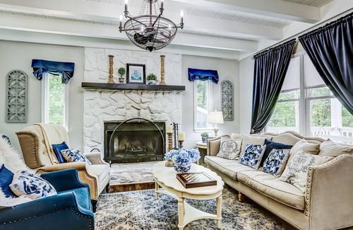 Epworth Cottage | Quaint wooded escape with wraparound deck, firepit, & fast WiFi - dog-friendly