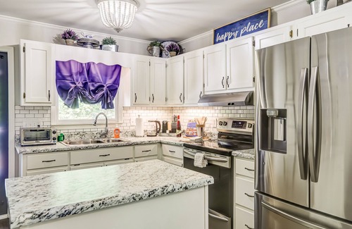Epworth Cottage | Quaint wooded escape with wraparound deck, firepit, & fast WiFi - dog-friendly
