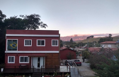 Sao Bento do Sapucai Apartment | Quarto Aconchegante