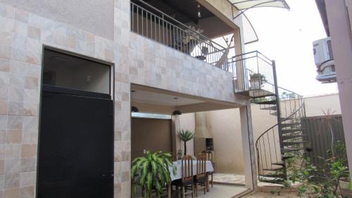 Uberaba House | Quarto Varanda com vista para natureza