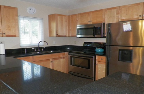 St. Pete Beach Condo | Quiet beach getaway with patio! Walk to the beach, bars, and restaurants!