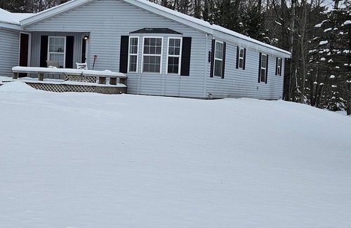Cadillac Cabin | Quiet up north retreat with access to Lake Mitchell and trails.