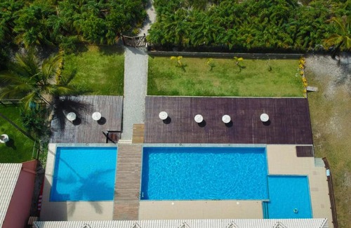 Aritagua Apartment | R.11 - Condomínio Praia da Pérola - Rodovia Ilhéus x Itacaré BA