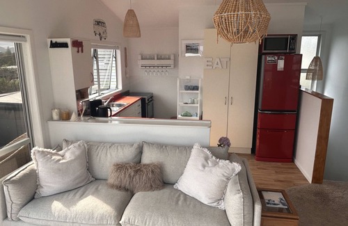 Raglan House | Raglan Beach House , Stunning Ocean and Harbour views out at Ocean Beach