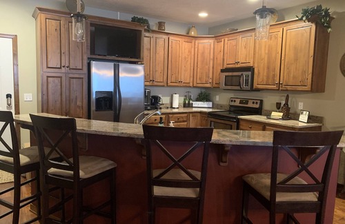Arnolds Park Condo | RARE Bridges Bay POOLSIDE condo with LAKE VIEW! - Sleeps 8