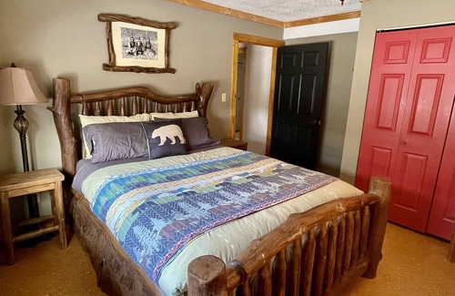 Jasper Apartment | Rare main floor suite, with full kitchen and balcony mountain views.