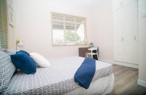 Woodbrook Apartment | RayneBow Chateau - Chic City Getaway