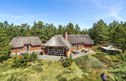 Blavand Strand House | Really cozy furnished cottage with a thatched roof.