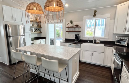 St. Augustine Beach House | Recently Remastered Beachside Boat House STEPS from the Ocean with HEATED pool.