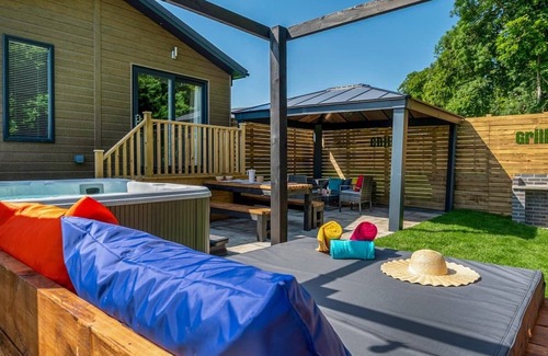 Raywell Ski Chalet | Recently upgraded with Gazebo over hot tub and side bar with stools.