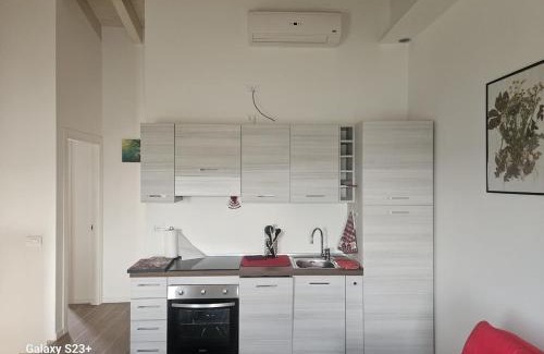 Costermano Villa | Red first floor apartment house