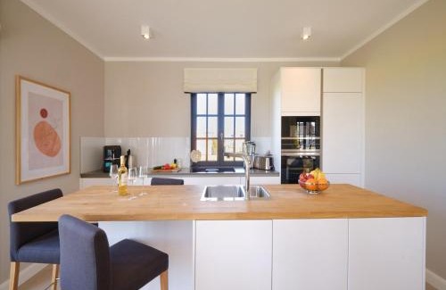 Dranske House | Reetland am Meer - LuxusPlus Reetdachvilla mit 4 Schlafzimmern und Kamin G11