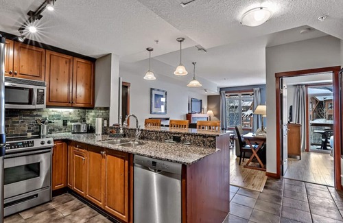Canmore Apartment | Relax & Explore: Mountain Views, Heated Pool & Dog-Friendly Condo