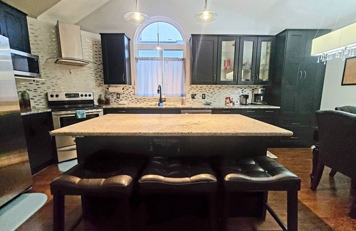 West Jordan House | Relax in the Hot Tub, Sleep in Comfort on a King Bed, Play Pool, Charge Your EV