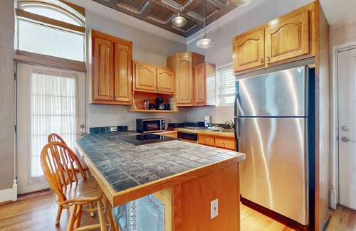 Whittier House | Relax riverside at this serene mountain getaway, complete with modern comfort.