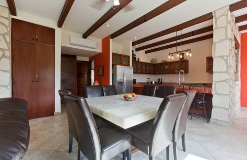 Villa Juarez Condo | Relax to the sound of a waterfall right outside your window!
