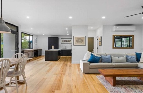 Horsfield Bay House | Relax with bush & water views