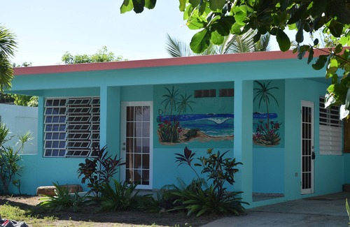 Hatillo House | Relaxed Oceanfront home on quiet palm fringed Beach with large Oceanfront patio