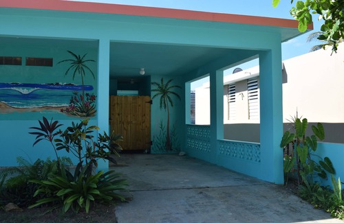 Hatillo House | Relaxed Oceanfront home on quiet palm fringed Beach with large Oceanfront patio