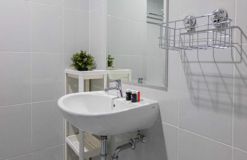 Pagedangan Apartment | Relaxing 1BR Room Casa De Parco Apartment