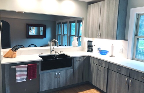 Riverwest Apartment | Remodeled flat in River West, deck and firepit, close to restaurants/coffee.