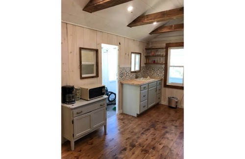 Ludington Cottage | Remodeled lakefront cottage w/marina, firepit, swimming area.