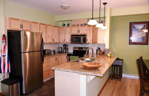 Canmore Apartment | Renovated Condo, 2BR, 2BA, Heated Pool, 3 Hot Tubs, Pets Welcome!