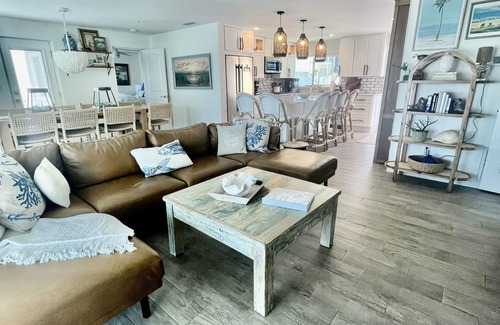 New Smyrna Beach House | Renovated, direct oceanfront 5BR/6BA private pool home sleeps 16.
