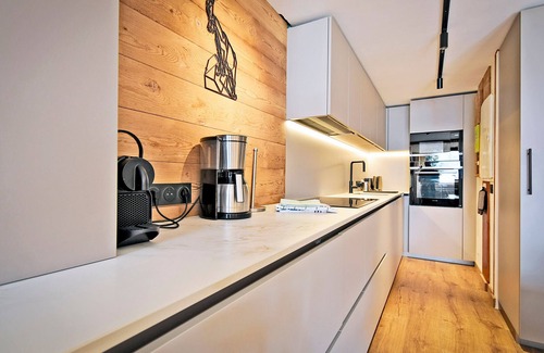 Les Bruyeres Apartment | Renovated family chalet with jacuzzi, ski-in, ski room