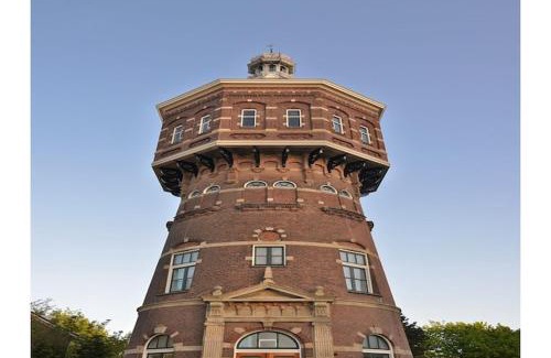 Vlissingen House | Renovated luxury water tower within walking distance of the beach boulevard