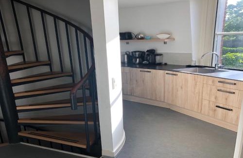 Vlissingen House | Renovated luxury water tower within walking distance of the beach boulevard