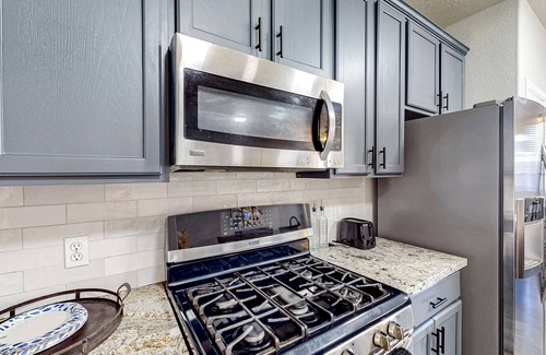 Conroe House | Renovated townhome with private yard, central AC, & private W/D