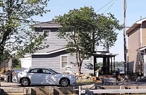 Russells Point House | Renovated Waterfront House with MASSIVE boat house and party deck