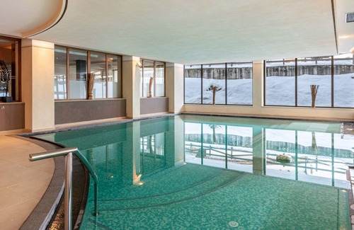 San Giovanni di Fassa Apartment | "Residence Anda Appartamento 51" with Views of the Dolomite Peaks, Shared Indoor Pool & Jacuzzi