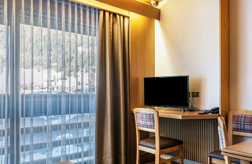 San Giovanni di Fassa Apartment | "Residence Anda Appartamento 42" with Views of the Dolomite Peaks, Shared Indoor Pool & Jacuzzi