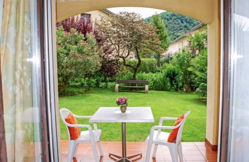 Caslano Apartment | Residenza Parcolago Apt 018 mit Garten by Interhome