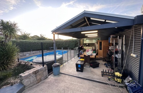 Hughes House | Resort style home pool spa sauna