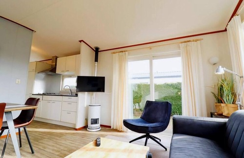 Hollum Ski Chalet | Restful Dune Chalet in Hollum between Golf course and Beach