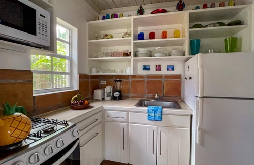 Governor's Harbour House | Restored Historic Cottage on Harbor, Sunset Views, Walk to Town and Beach